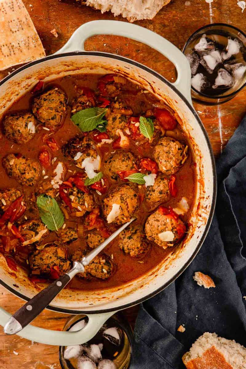 meatballs in a tomato sauce in a dutch oven pot