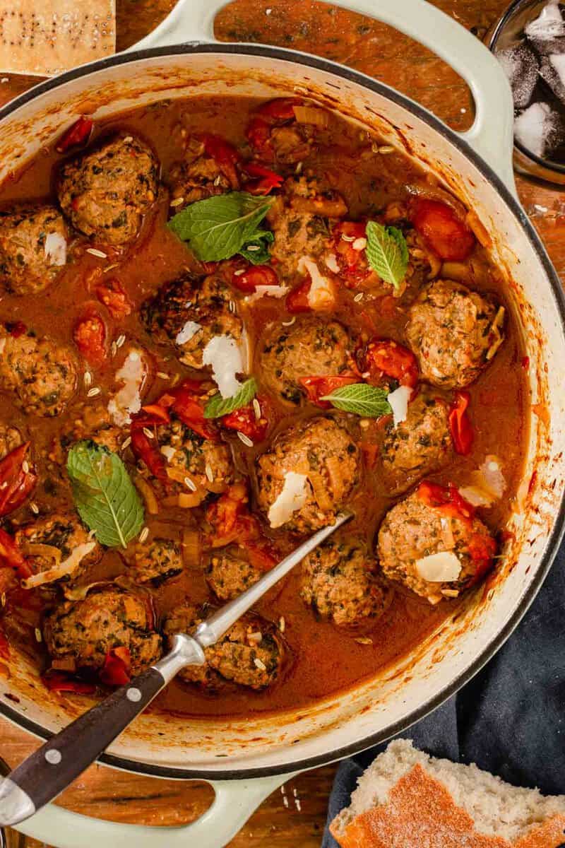 meatballs in a tomato sauce in a dutch oven pot