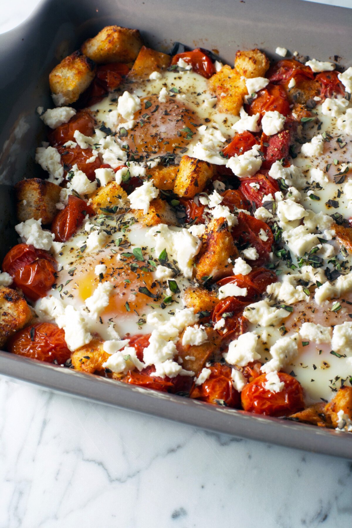 Baked Eggs with Tomatoes, Feta, and Croutons | Zestful Kitchen