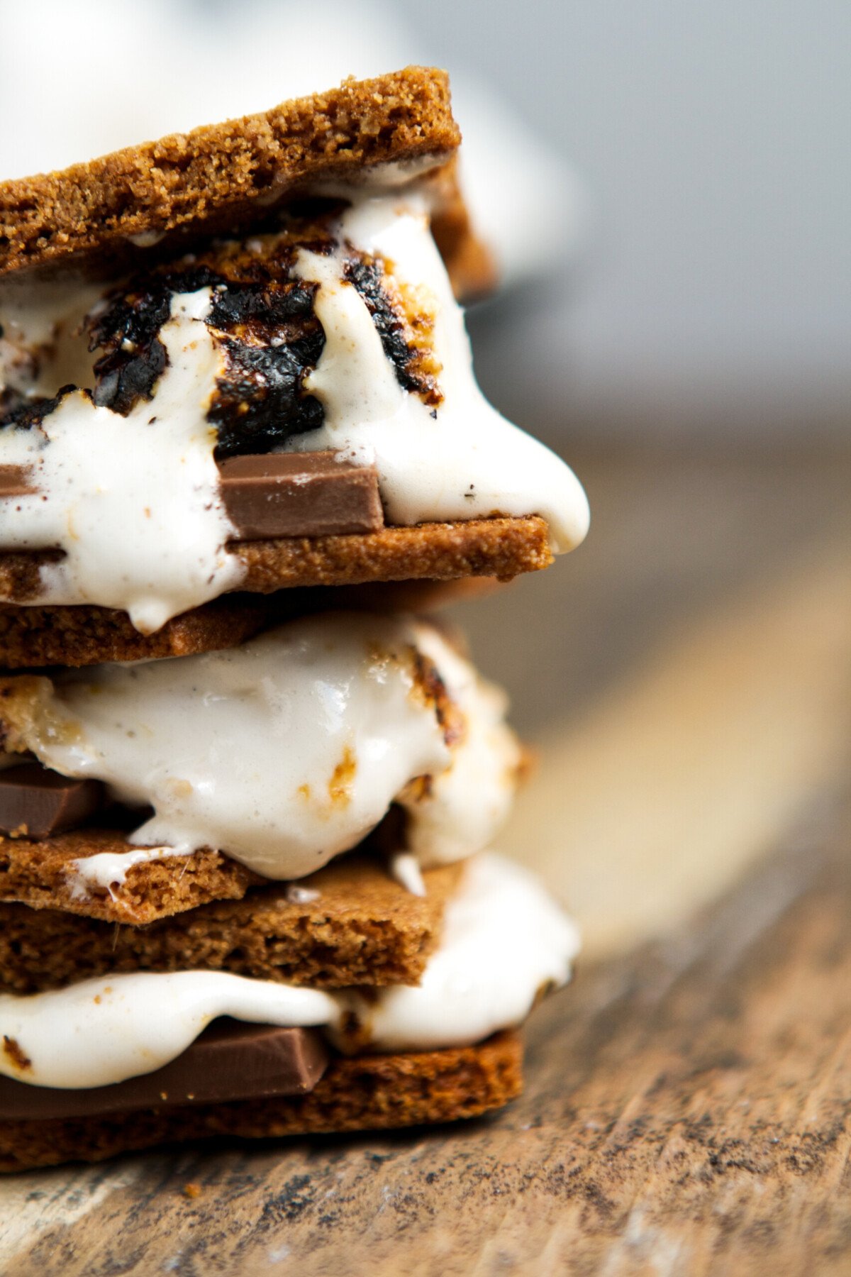 Homemade healthy marshmallows melted and sandwiched between graham crackers