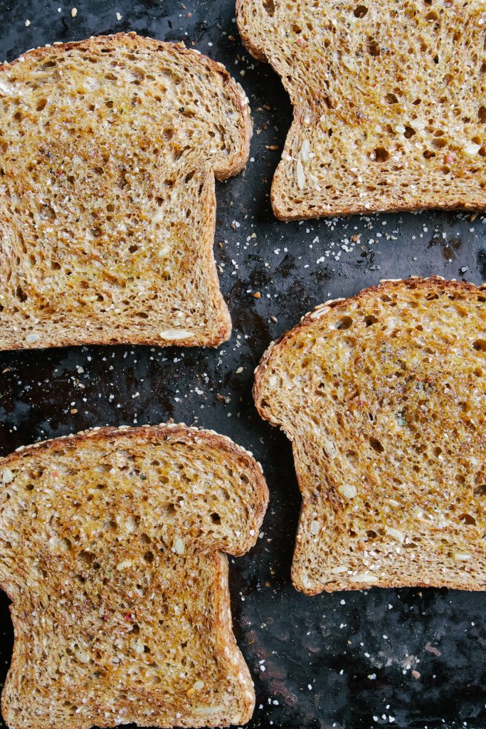 Toasted Whole Grain Bread Gets Topped With Creamy Smoked Gruyere, Salty ...