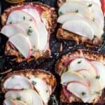 Toasted whole grain bread gets topped with creamy smoked gruyere, salty ham, and slices of honeycrisp apple. It gets broiled to melty perfection then drizzled with honey and earthy thyme, these toasts are perfect for breakfast, lunch, or dinner. | Zestful Kitchen