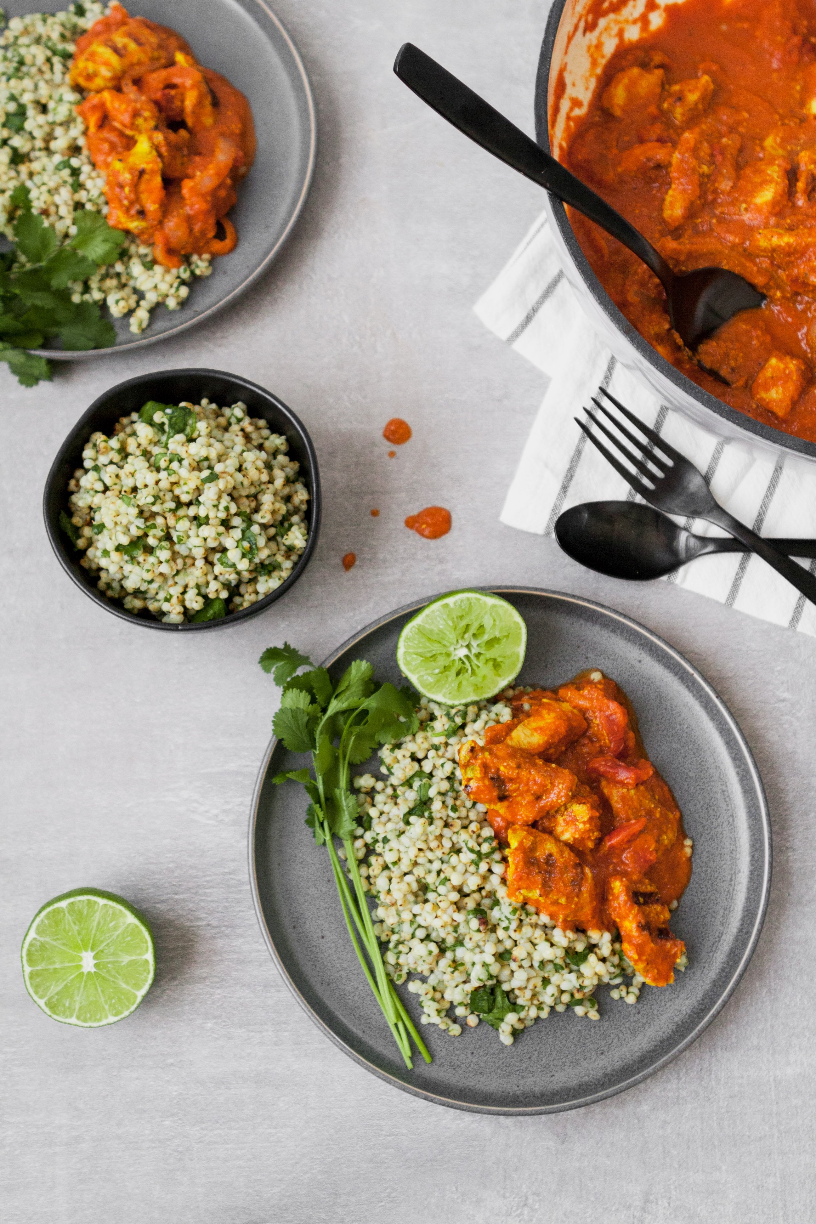 This Lightened Chicken Tikka Masala is full-flavored, healthy, and even a great make ahead meal. Atop a bed of cilantro-lime sorghum, this is classic, yet reinvented.  | from Lauren Grant of Zestful Kitchen