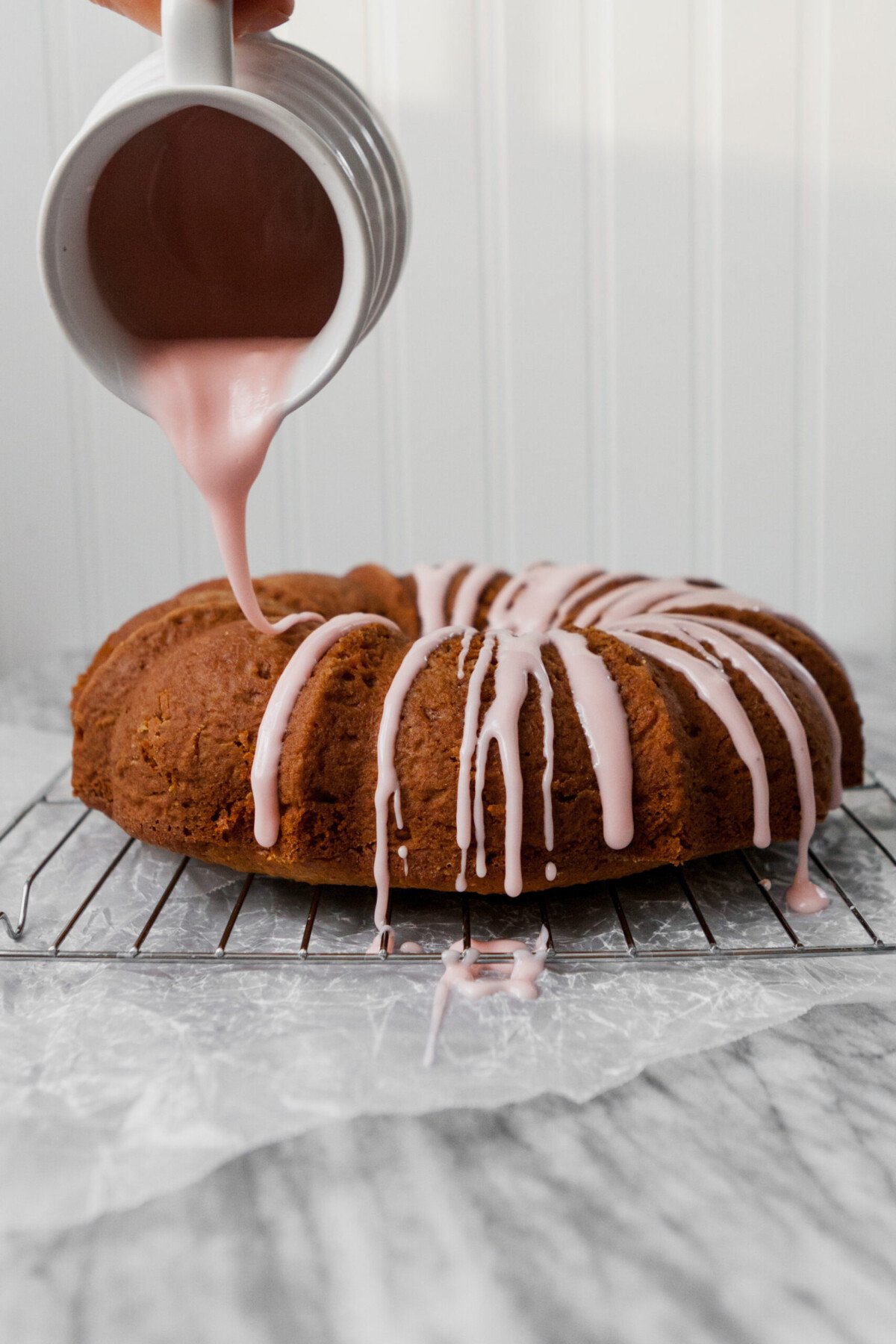 Tender bundt cake flavored with fresh grapefruit and Campari. This cake is naturally sweetened with honey, easy to whip, and elegant enough for a fancy party. | from Lauren Grant of Zestful Kitchen