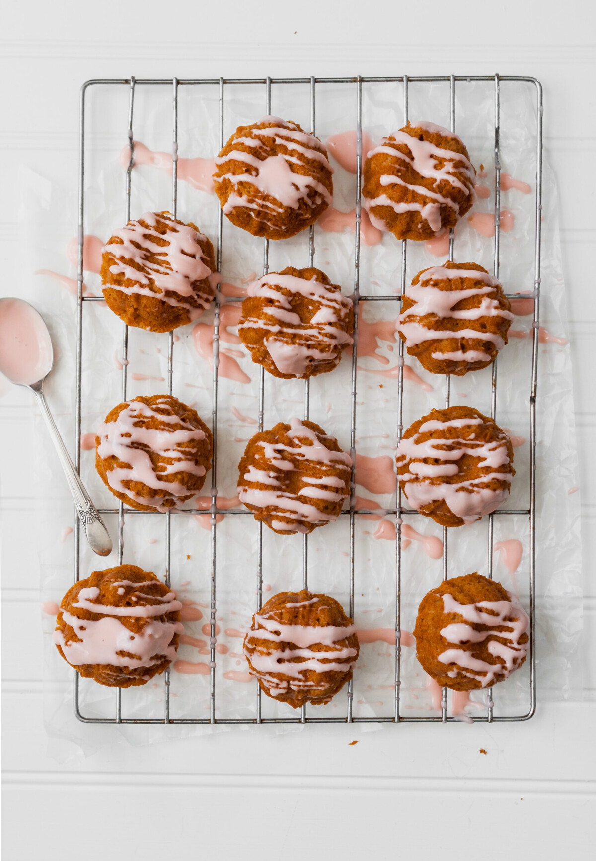 Tender tea cakes flavored with fresh grapefruit and Campari. These mini cakes are naturally sweetened with honey, easy to whip, and elegant enough for a fancy party. | from Lauren Grant of Zestful Kitchen 
