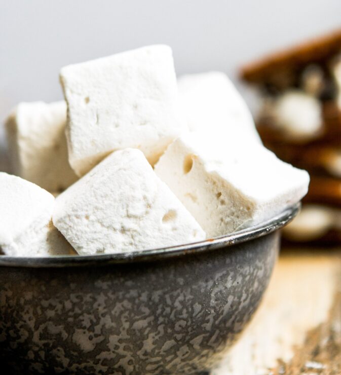 Photograph of homemade marshmallows in a metal bowl