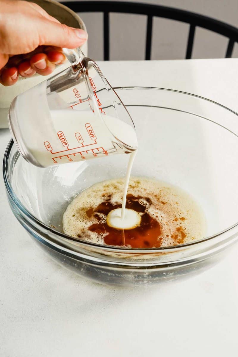 Photograph of buttermilk being poured into a bowl with brown butter