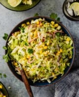 green slaw with sweet corn in a blue bowl