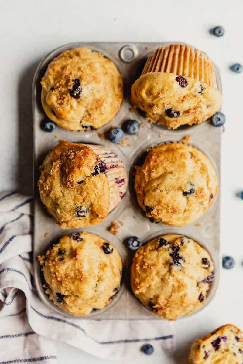 Healthy blueberry muffins in a muffin tin.