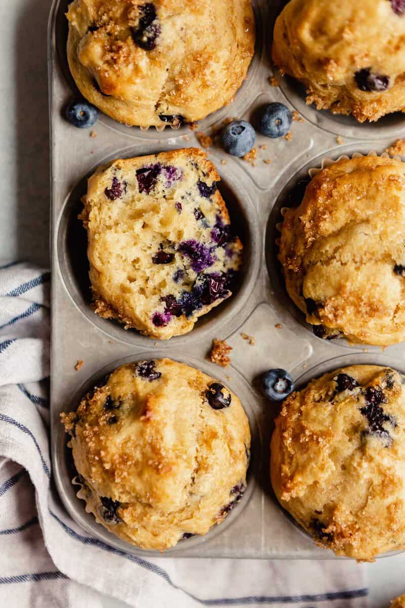 Healthy blueberry muffins in a muffin tin.