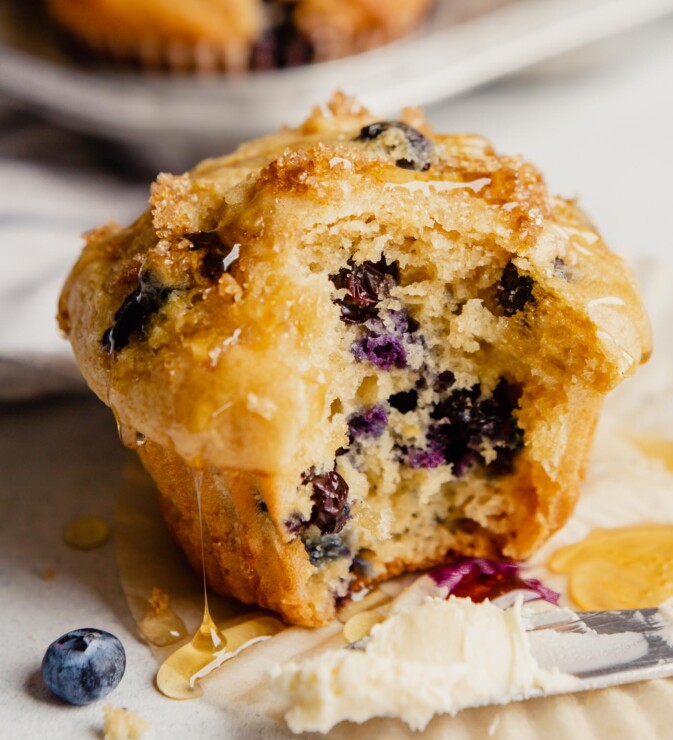 image of a blueberry muffin dropping with honey