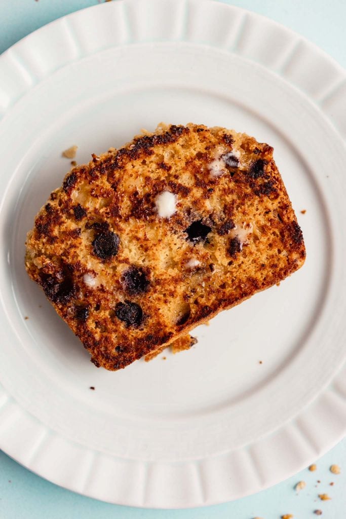 toasted piece of lemon blueberry bread on a plate