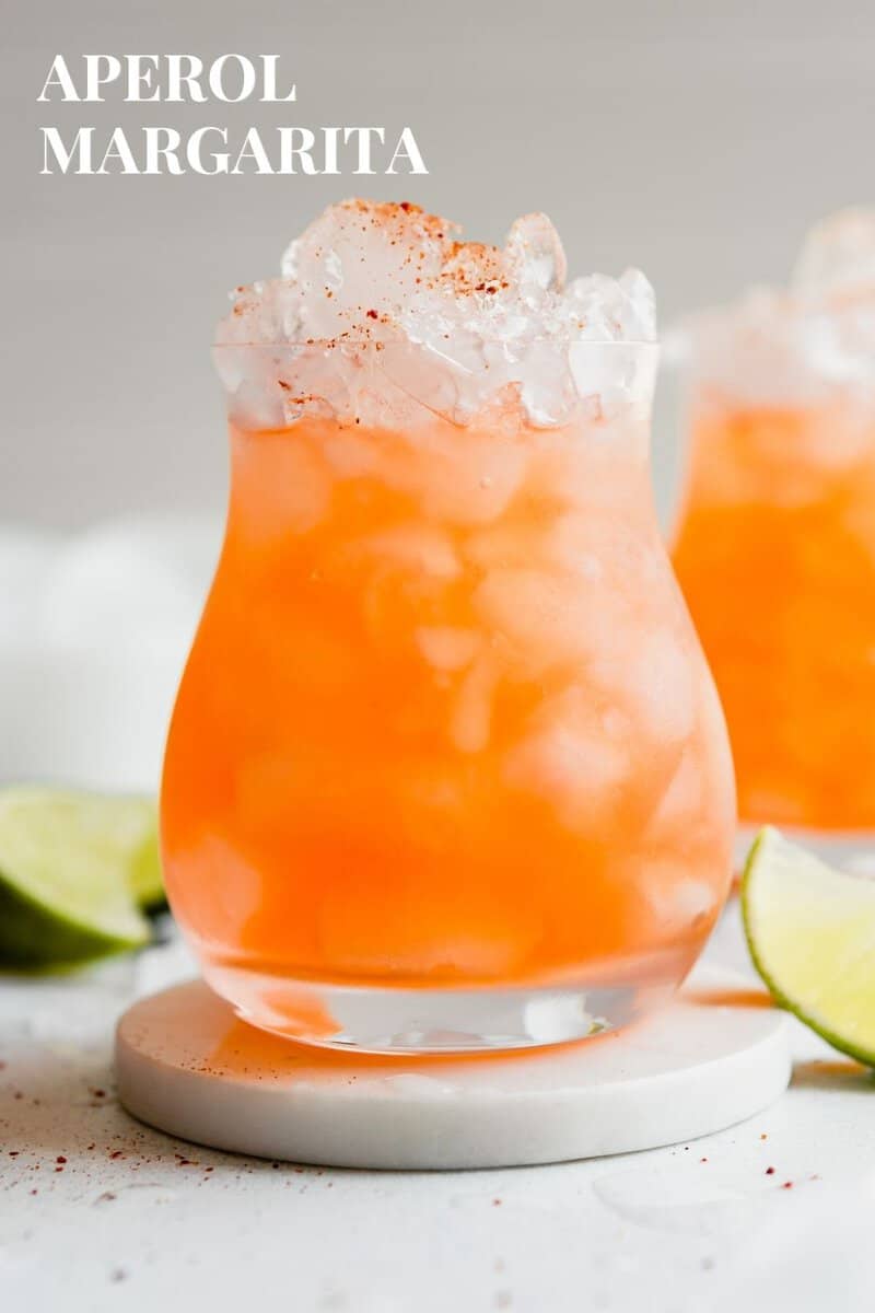orange cocktail in a rocks glass filled with crushed ice