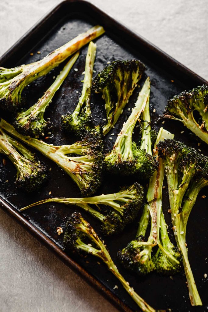 roasted broccoli wedges on a baking sheet