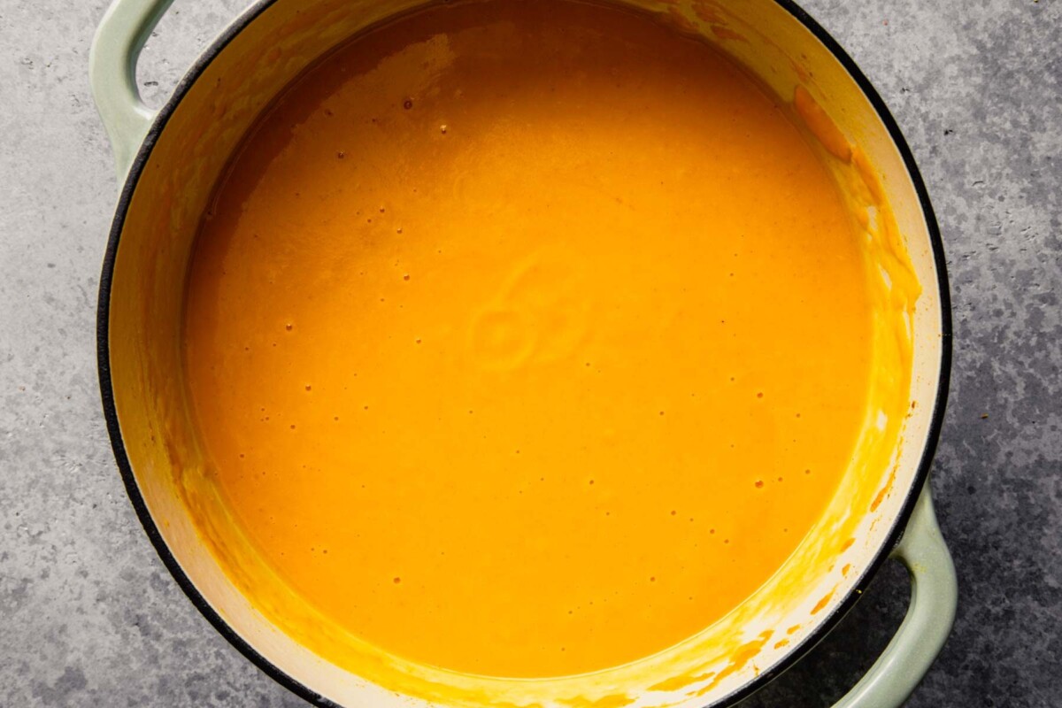 pureed carrot soup in a large dutch oven