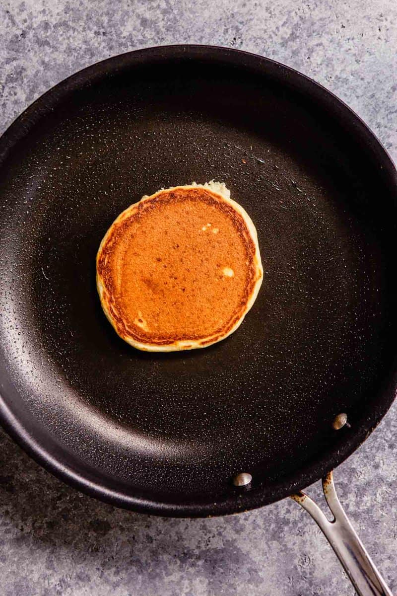 pancake cooking in a nonstick skillet