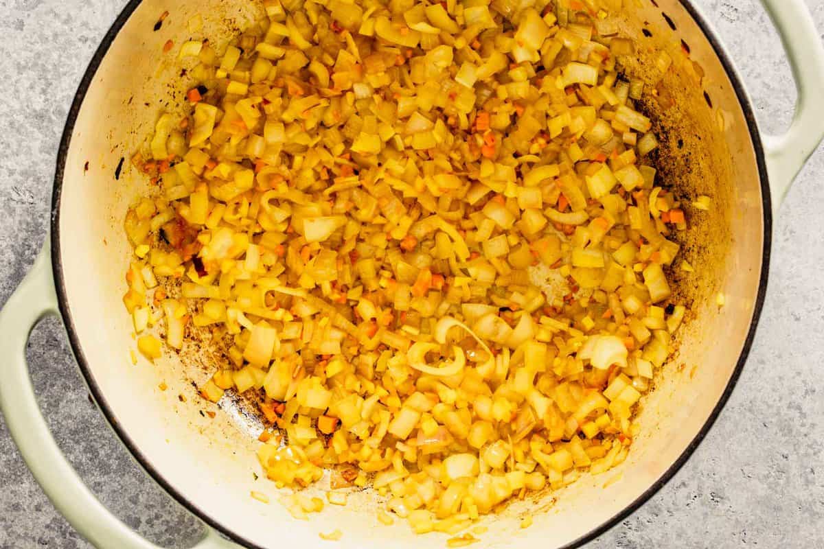 diced shallots, garlic and turmeric in a large pot