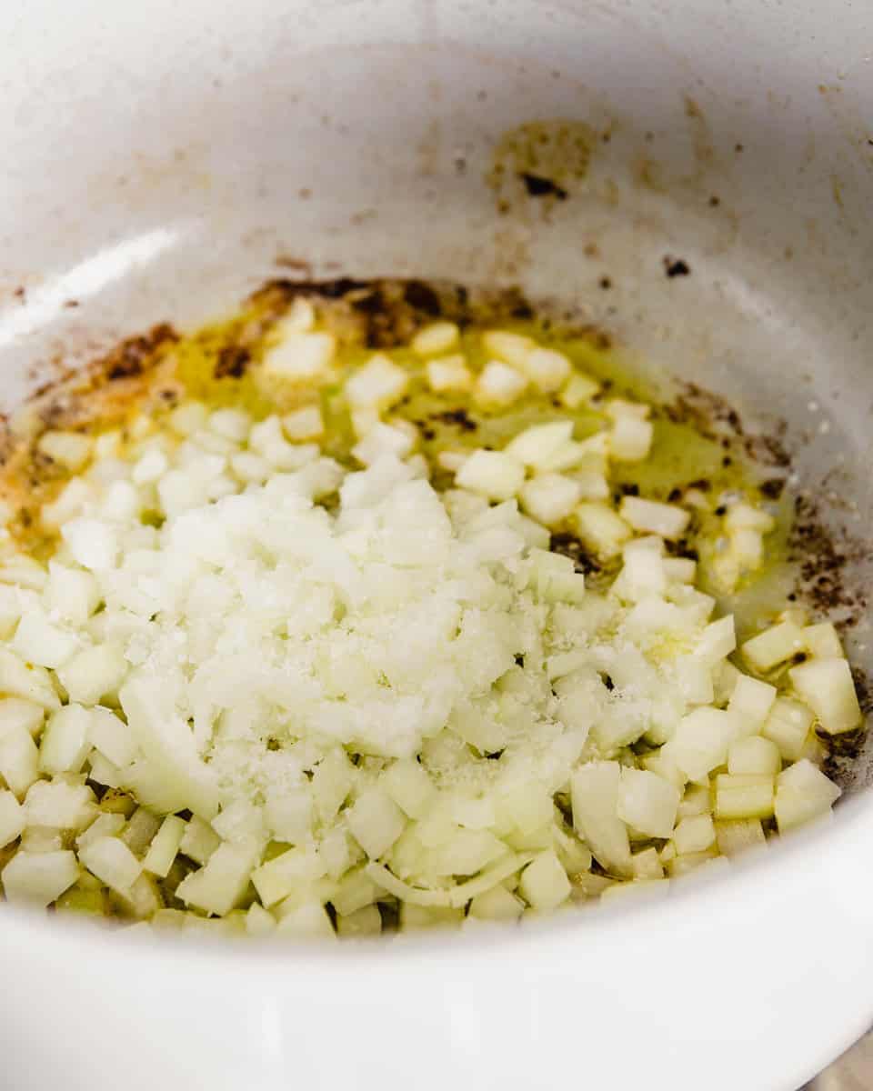 onions and oil in a large pot with fond on the bottom