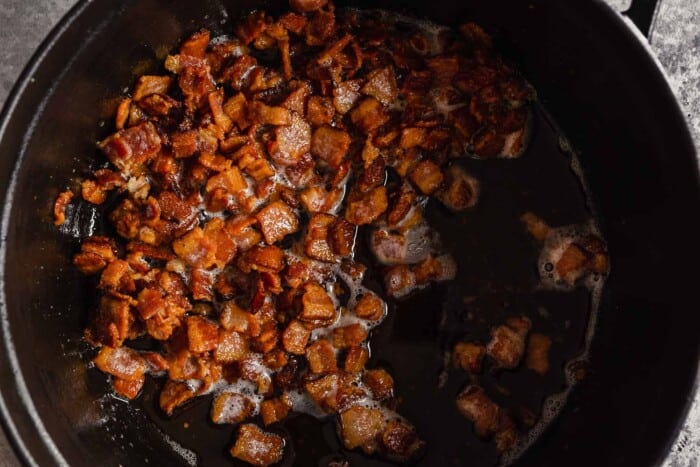 diced bacon cooked in a Dutch oven