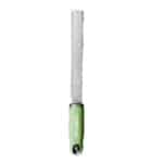 microplane with green handle on white background