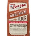 bag of whole wheat flour on a white background
