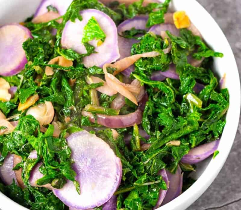 thin slices of radishes in sauteed greens