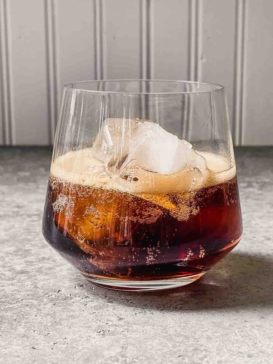 cola in a rocks glass with ice
