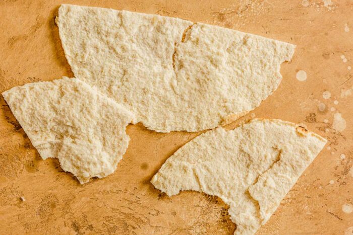 pita bread separated into two thinner halves