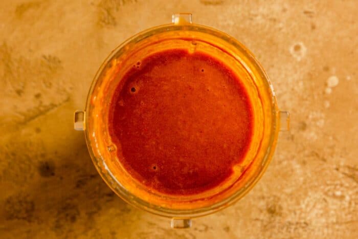 red-orange sauce in a cup