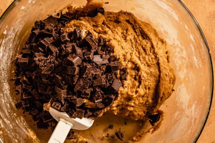 chocolate added to bowl of cookie dough