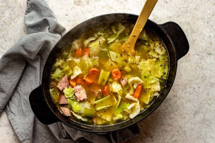 broth, vegetables and ham in a large pot