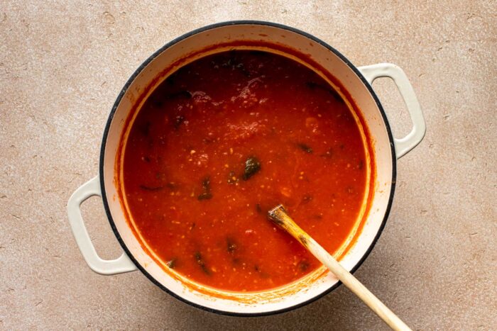 tomato soup in a white dutch oven
