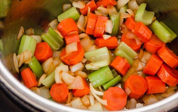 chunks of carrots, onions and celery in an instant pot