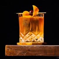 old fashion cocktail on a wood table