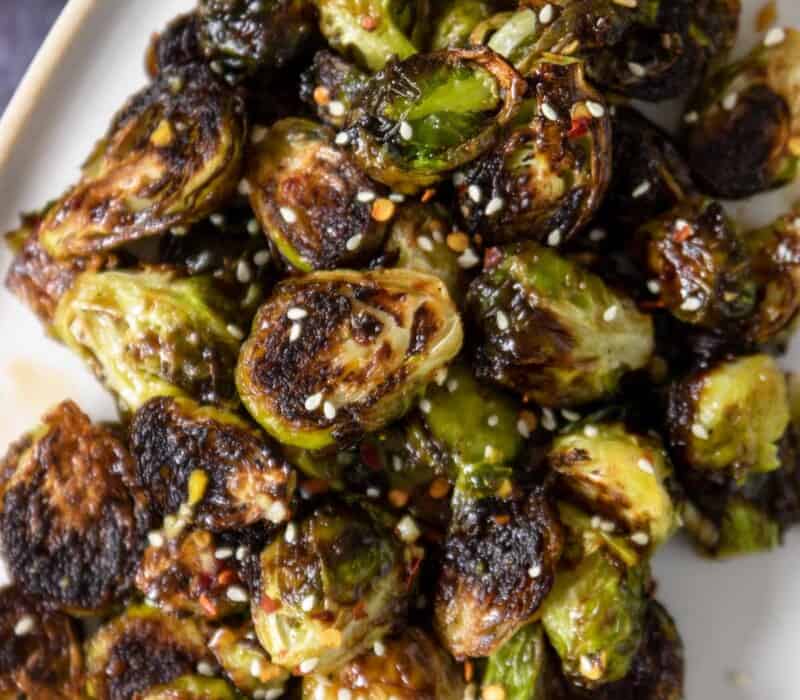roasted brussels sprouts on an oval platter