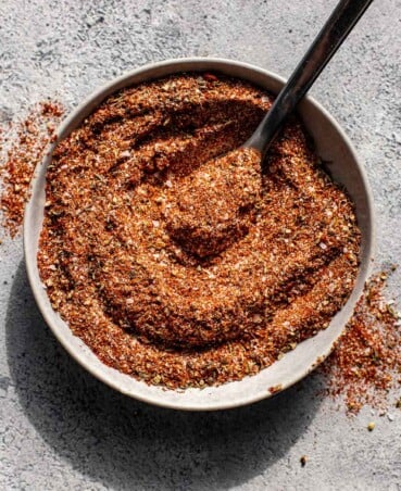 blackened spice mix in a shallow bowl with a spoon