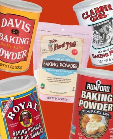 baking powder containers on an orange background