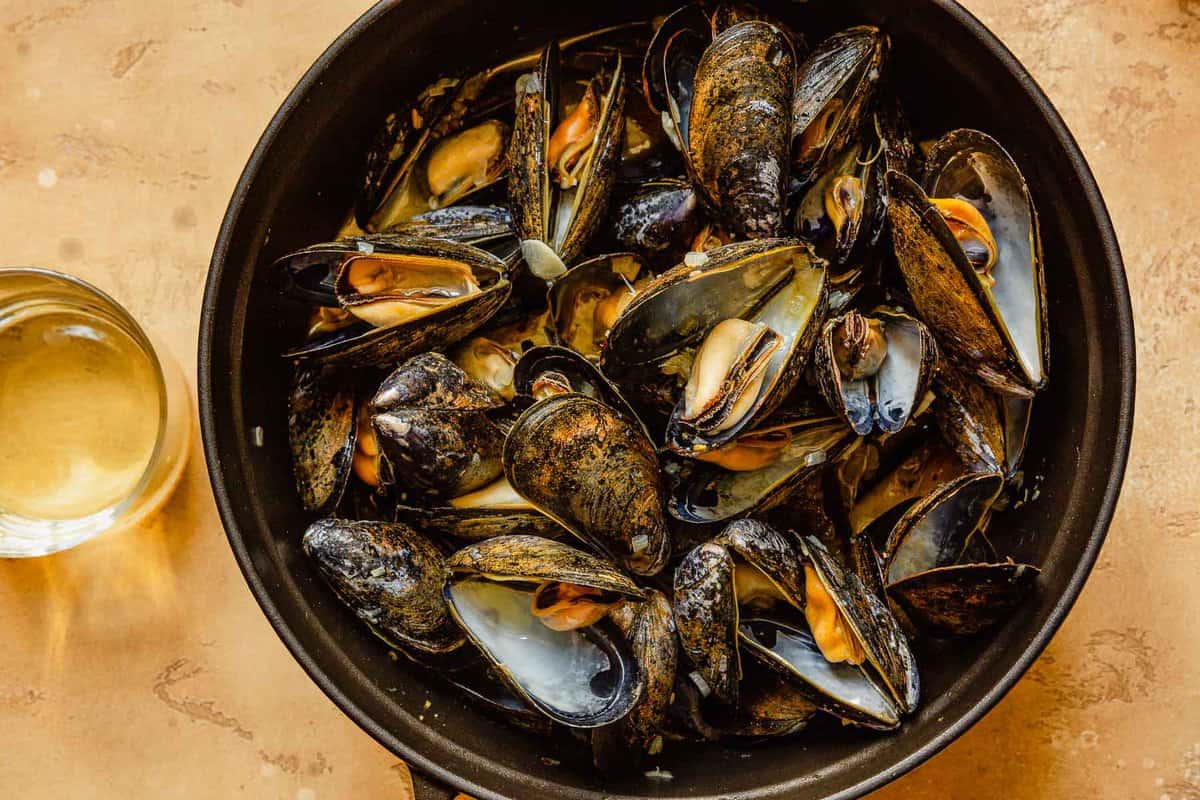 cooked mussels in a large pot