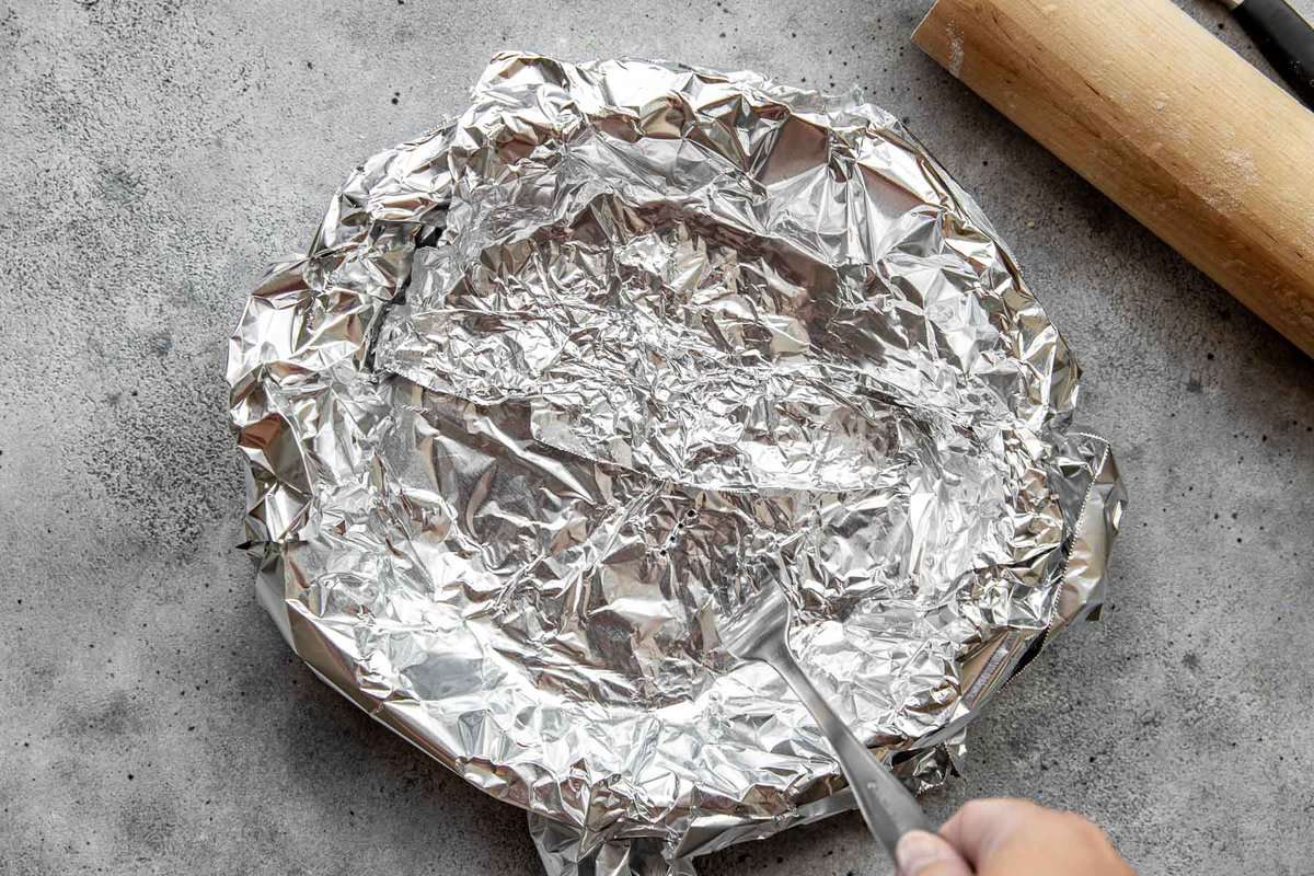 foil lining pie plate.