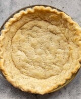 baked pie crust in a pie plate.