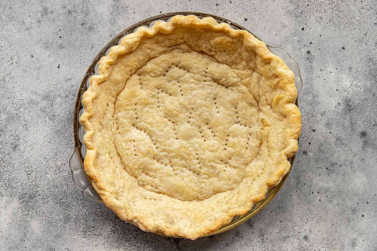 baked pie crust in a pie plate.