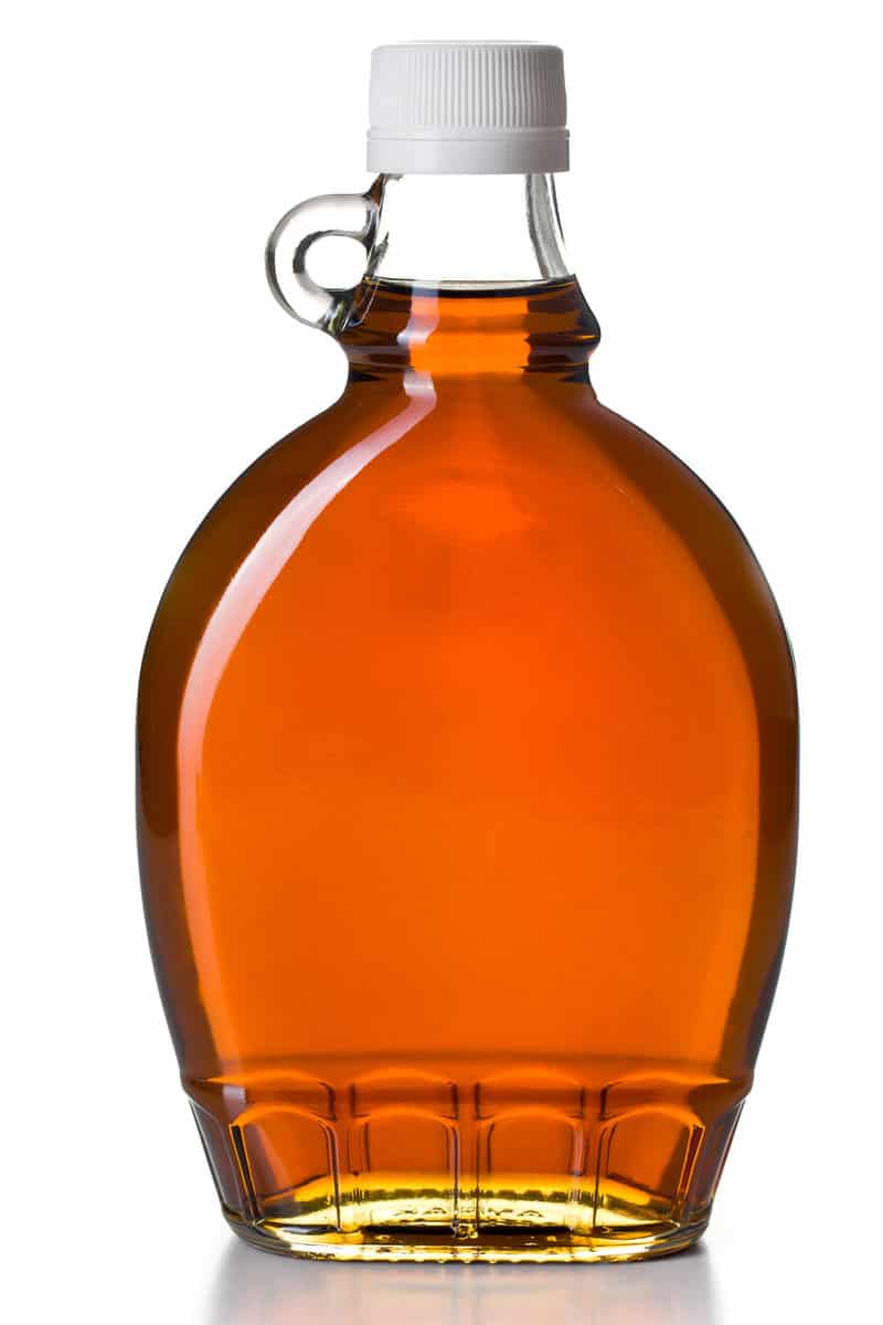 maple syrup in a glass maple syrup bottle.