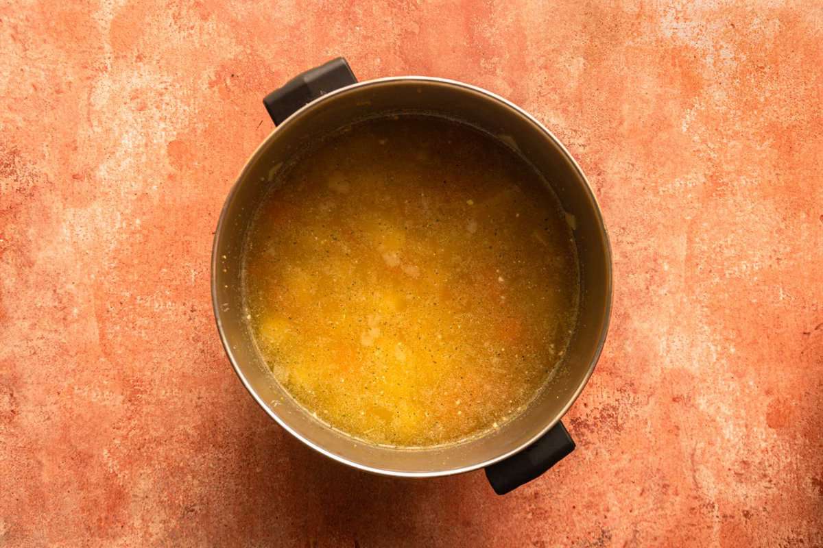potatoes and broth in a large pot.