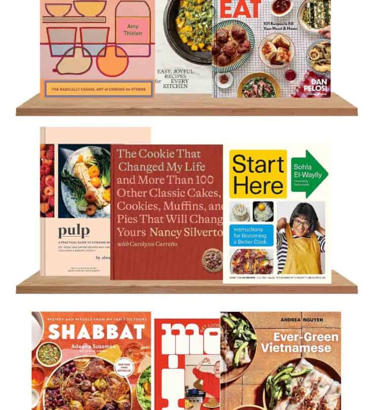 graphic image of three shelved with cookbooks from 2023 set on them, including The Cookie That Changed My Life, More is More, Company, Let's Eat, Snacking Bakes, Start Here and more.