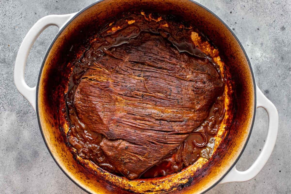 slow-roasted beef brisket in a large Dutch oven