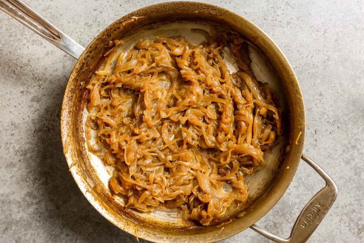 Caramelized onions in a sauté pan.