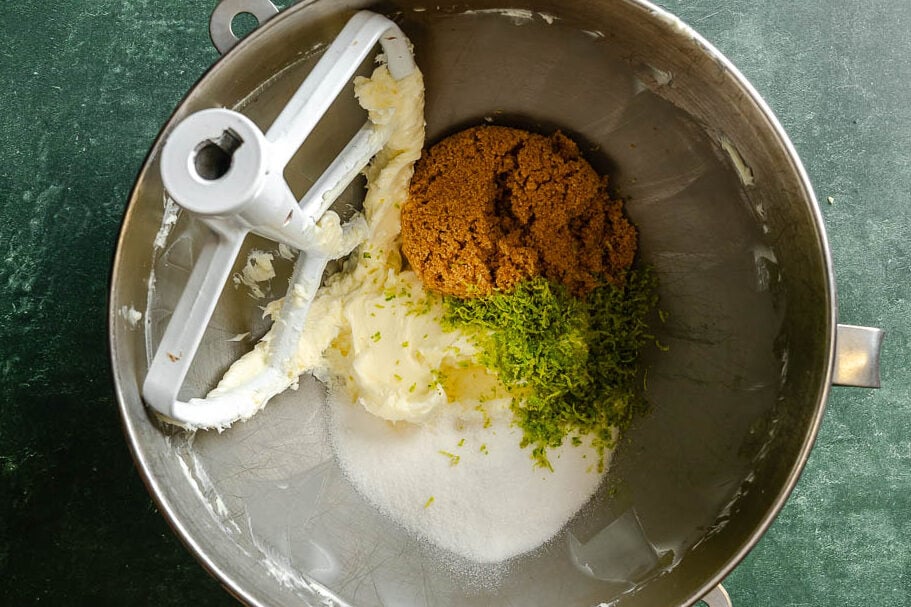 Sugar, brown sugar, butter and lime zest in a mixing bowl.